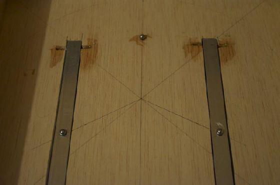 Collage des billes et tiges de support de collim