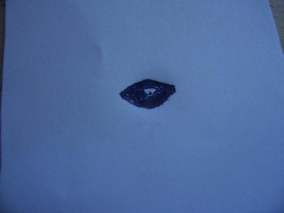 Dessin d'une microparticule lunaire ovale Dessin d'une microparticule lunaire ovale