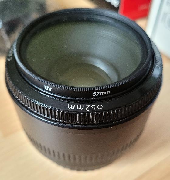 Objectif Canon 50mm f1.8 pare soleil UV52mm
