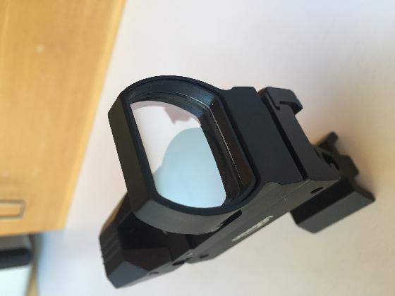 Chercheur point rouge omegon