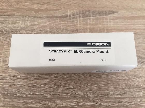 Support pour appareil photo derrière oculaire