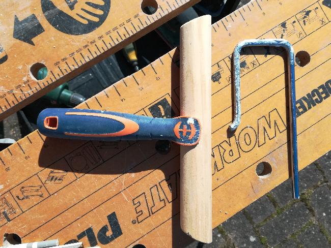 le manche et la barre support