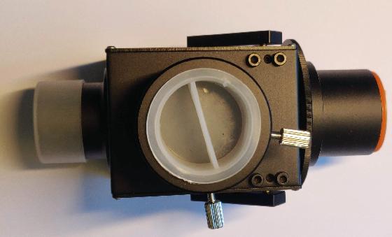 Miroir basculant pour mise au point.