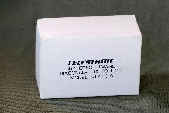 Deux oculaires, redresseur terrestre et adaptateur photo