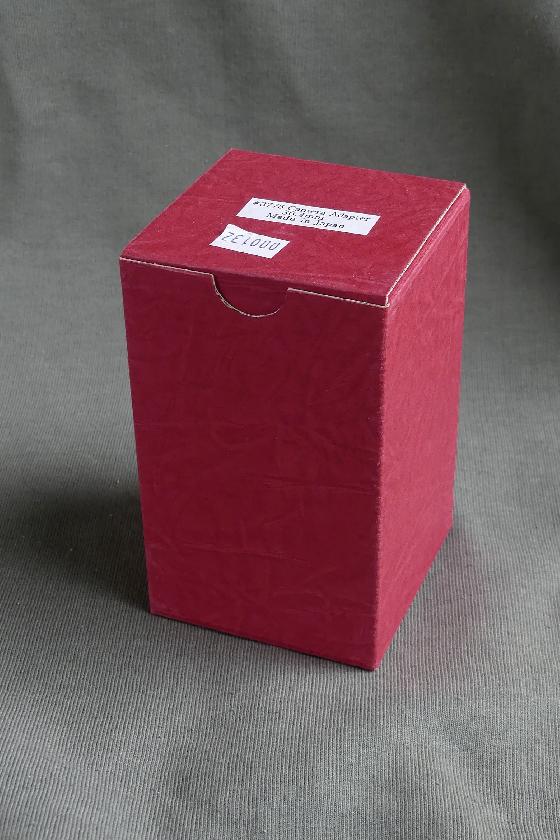 Deux oculaires, redresseur terrestre et adaptateur photo