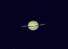 Saturne entre 2 nuages