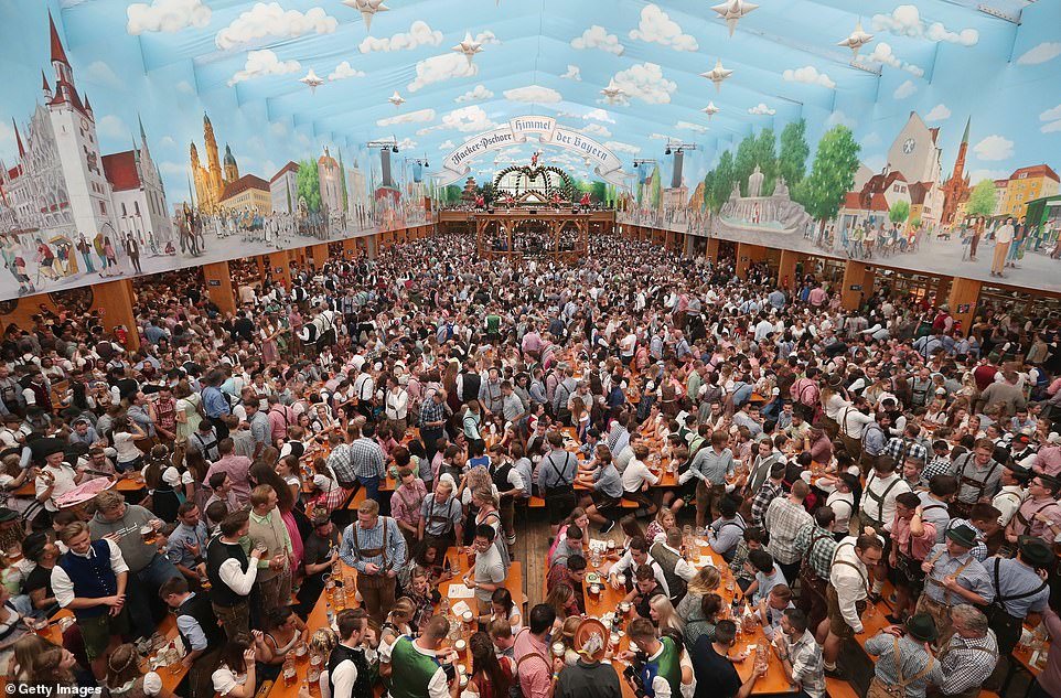 4474032-6196459-Visitors_celebrate_in_a_