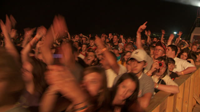 crowd-at-outdoor-night-concert-oshkosh-wi-usa-video-id119314228?s=640x640