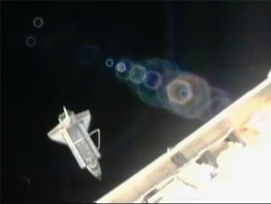 th_678472711_shuttle_discovery_station_undocking_110307_122_175lo.jpg